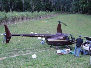  Helicóptero que pertence à empresa do deputado mineiro Gustavo Perrella foi apreendido com mais de 400 quilos de cocaína no Espírito Santo. (Foto: Polícia Militar do ES)